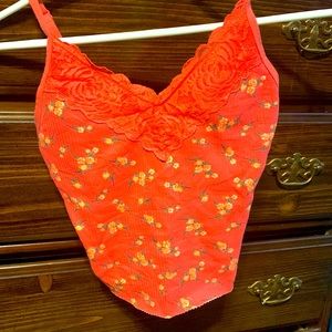 Victoria’s Secret orange tank top with flowers